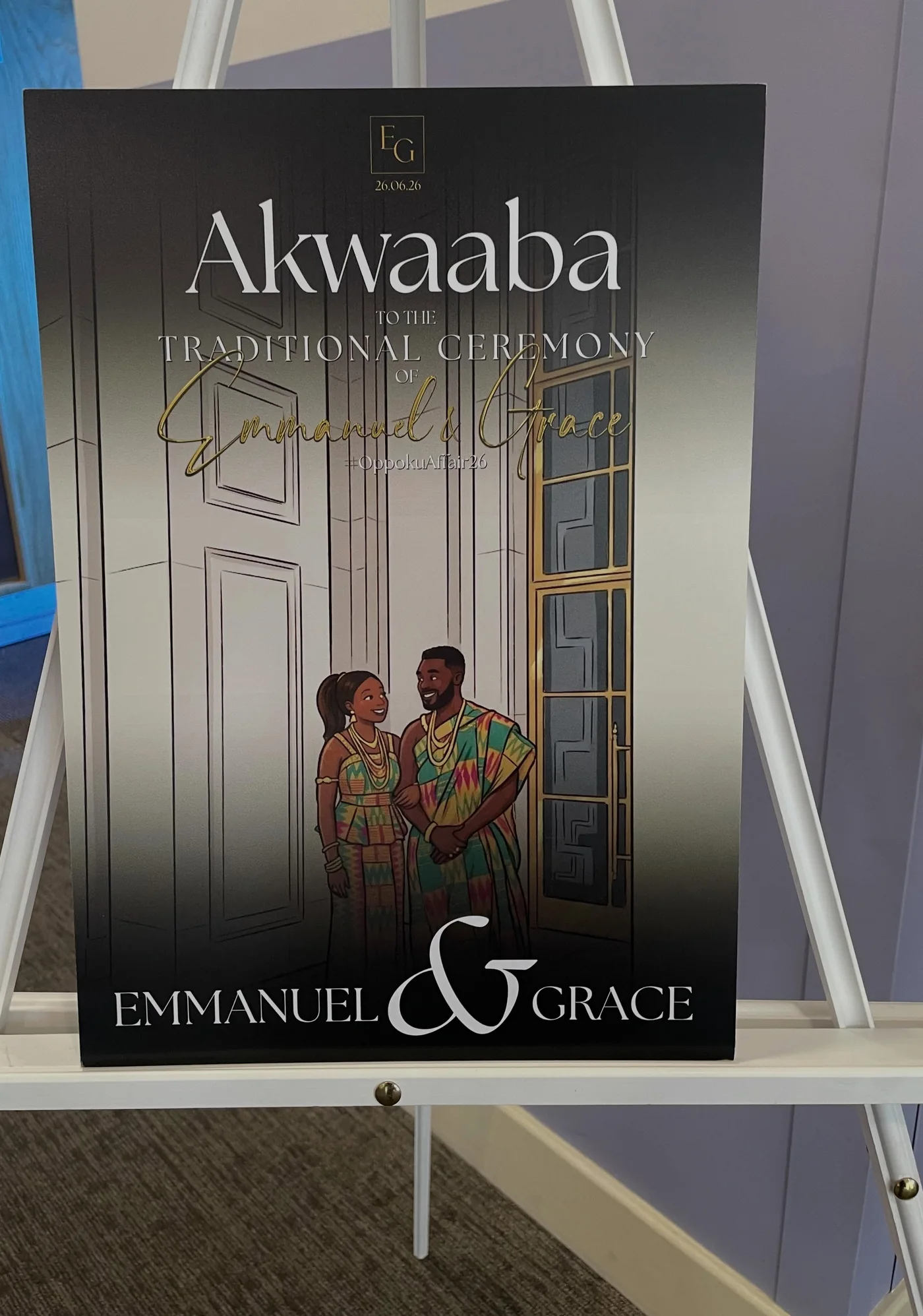 Black and gold Akwaaba welcome board for Emmanuel and Grace's traditional ceremony, on an easel