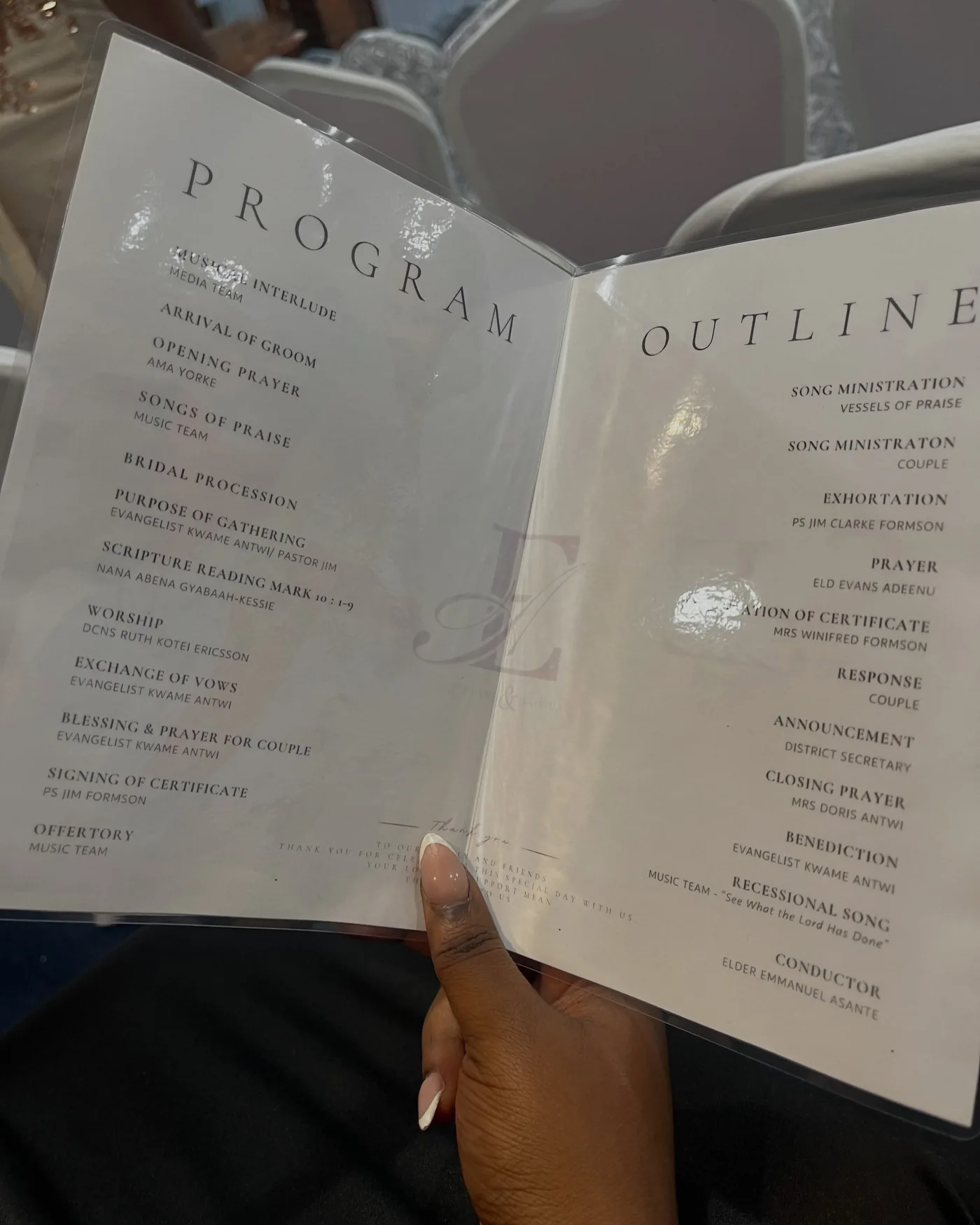 Open wedding programme booklet with a bespoke monogram