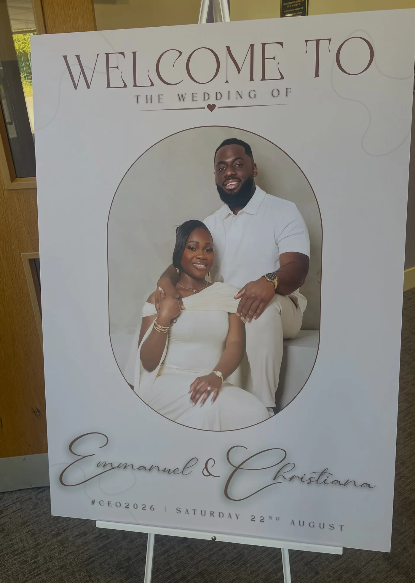 A welcome board on an easel for Emmanuel and Christiana